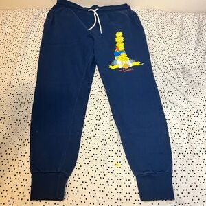 All dark blue The Simpson themed sweatpants.